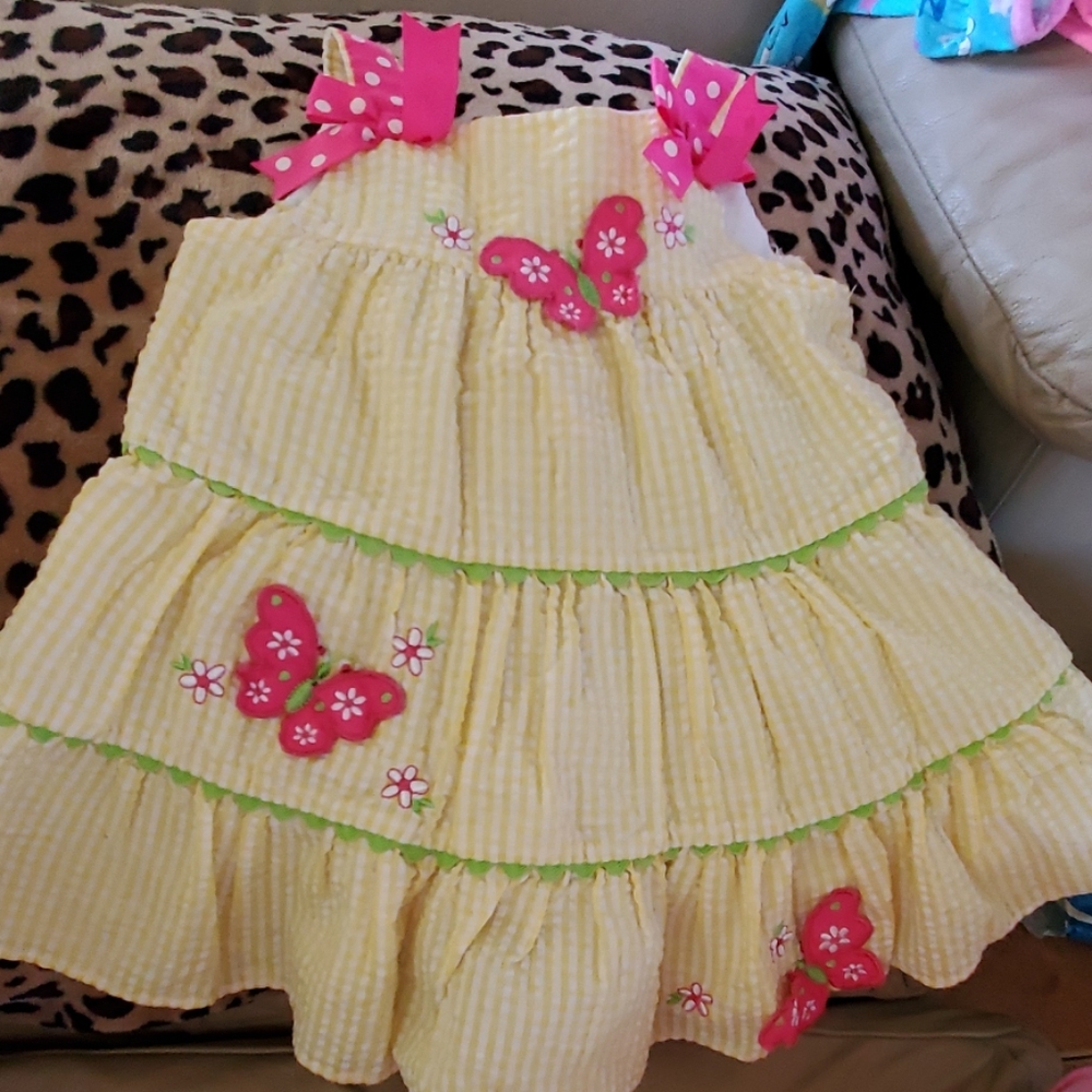 Yellow with pink butterfly's dress